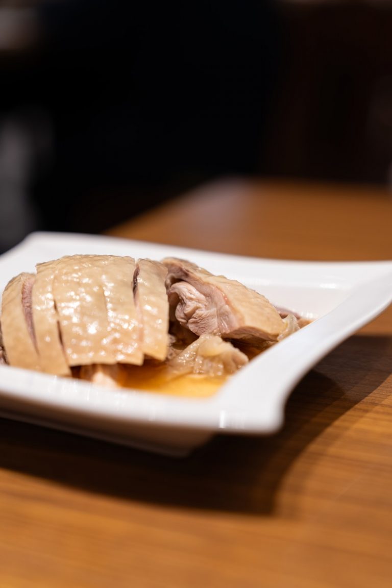 A plate of food on a wooden table